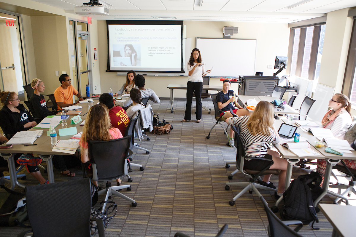 Classroom of students learning in Roskens Hall.