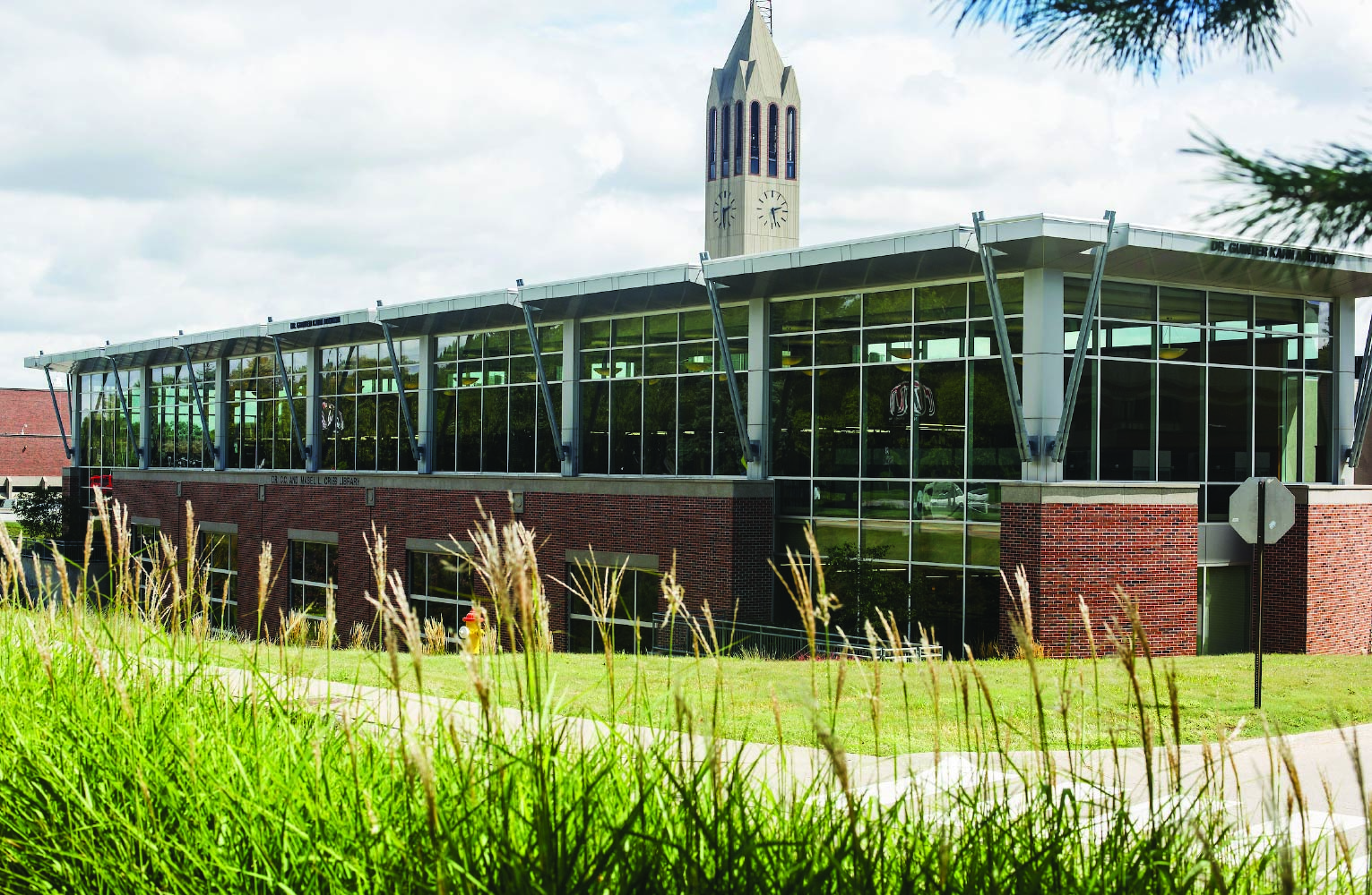 Textbook Mavericks logo in black and red text within a bordered square.