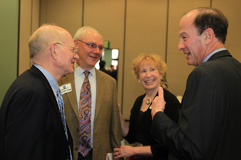 Ambassadors discuss the presentation.