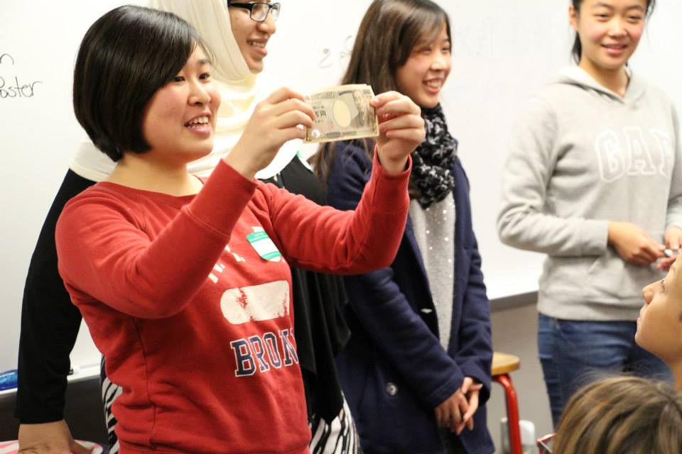 Student holding money