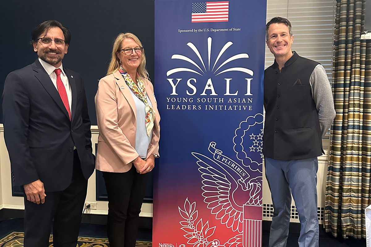 ysali team implementors from UNO and EWC standing with banner