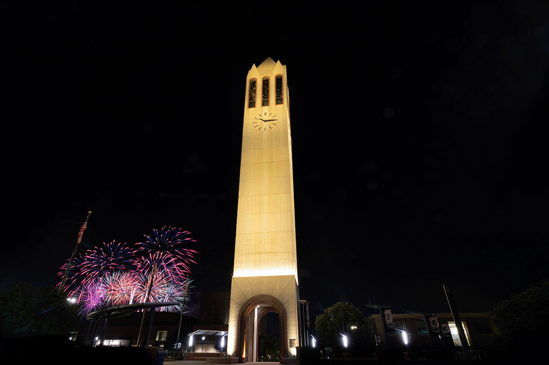 uno's campanile at night, with fireworks