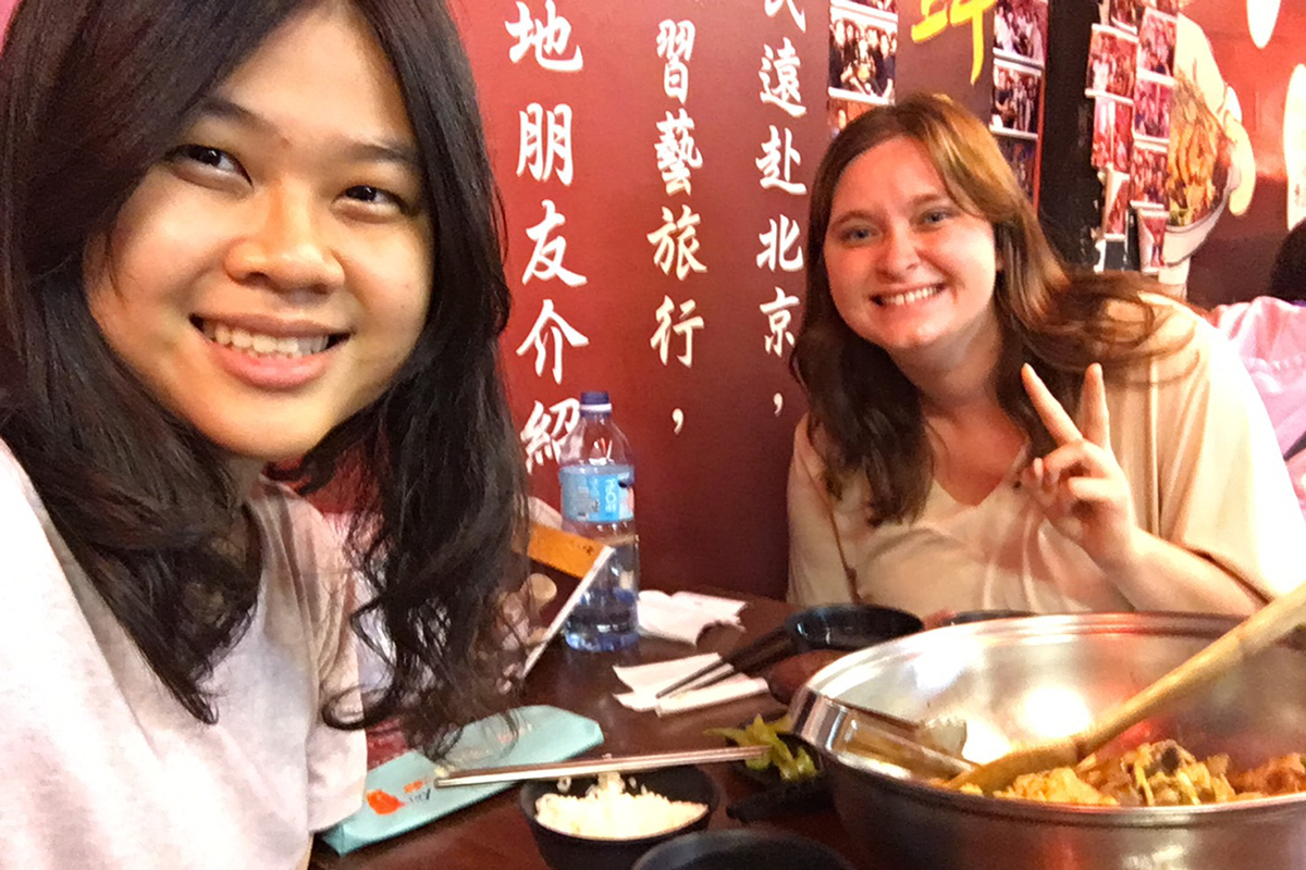 Amber and a friend share a meal during her summer in Tainan, Taiwan