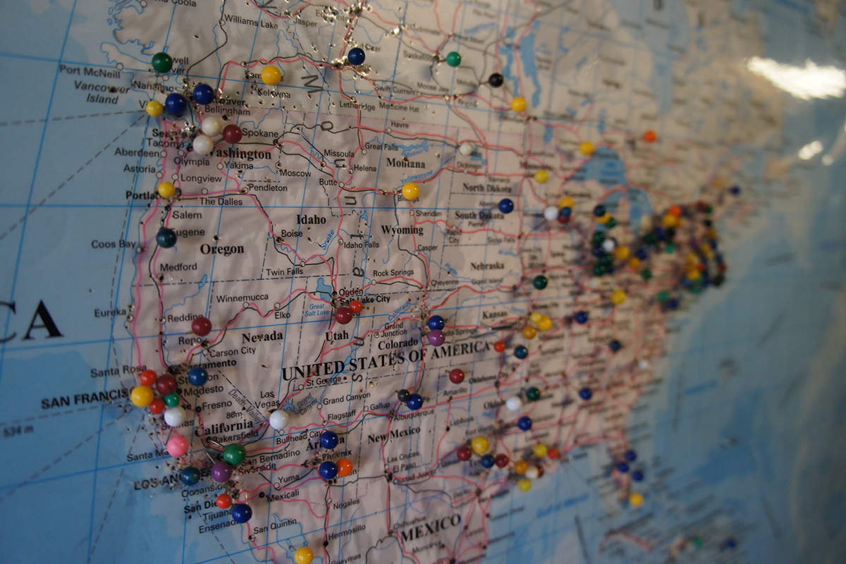 Map of the United States with push pins marking places people have been