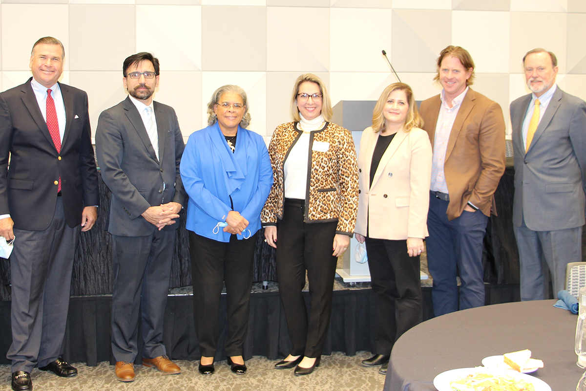 From left to right: Ambassador W. Stuart Symington IV, Sher Jan Ahmadzai, Ambassador Wanda L. Nesbitt, Emily Hassenstab, Dr. Jane Meza, Michael Jung, and Ambassador Tibor P. Nagy Jr stand together in the Scott Conference Center.