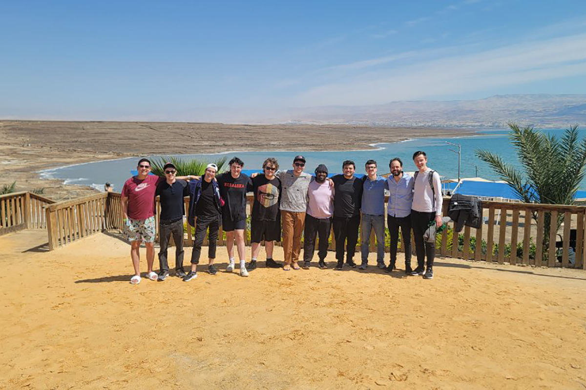 UNO Jazz Students pose together in front of the Dead Sea