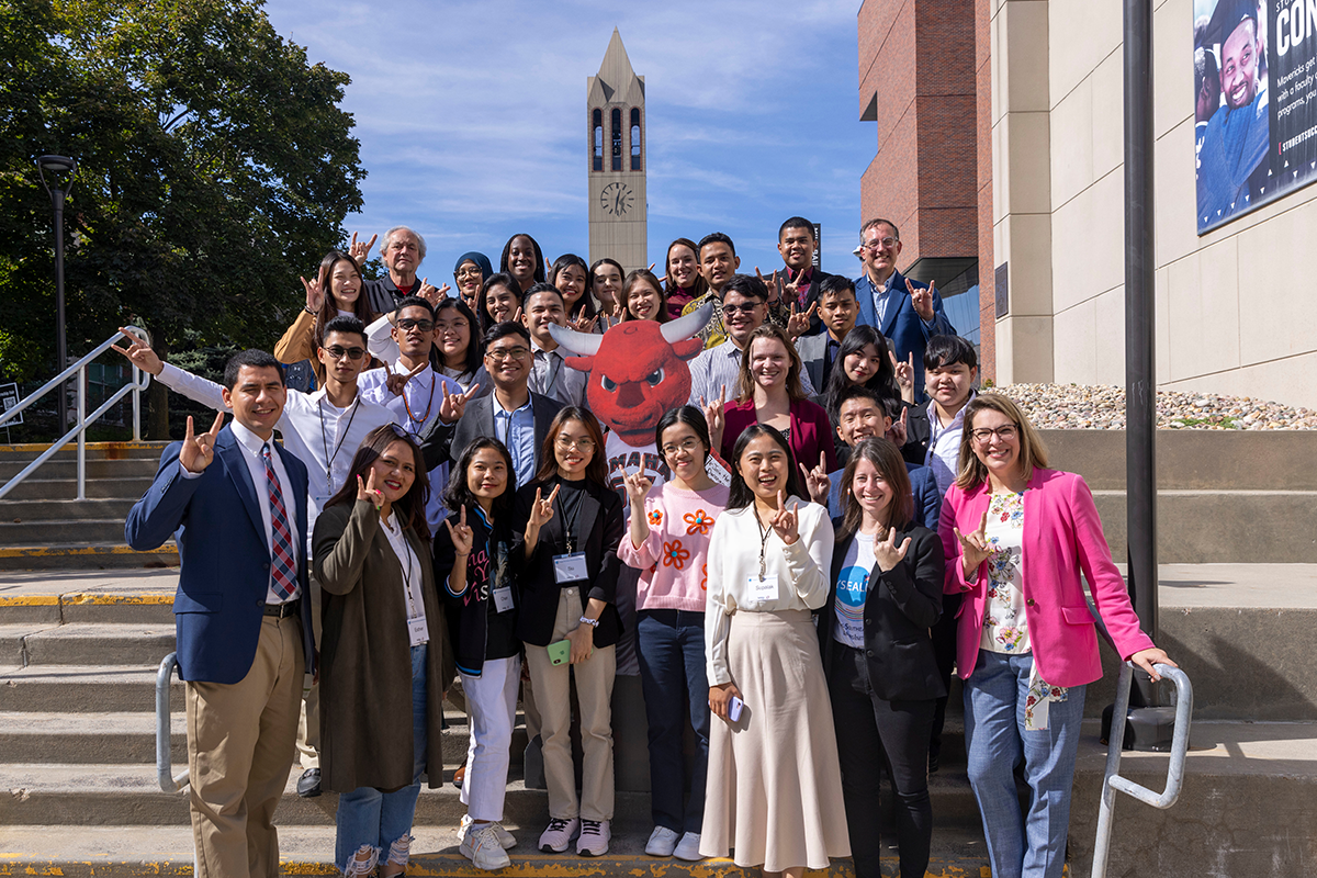 YSEALI group poses in front of the student center with Durango cut-out.