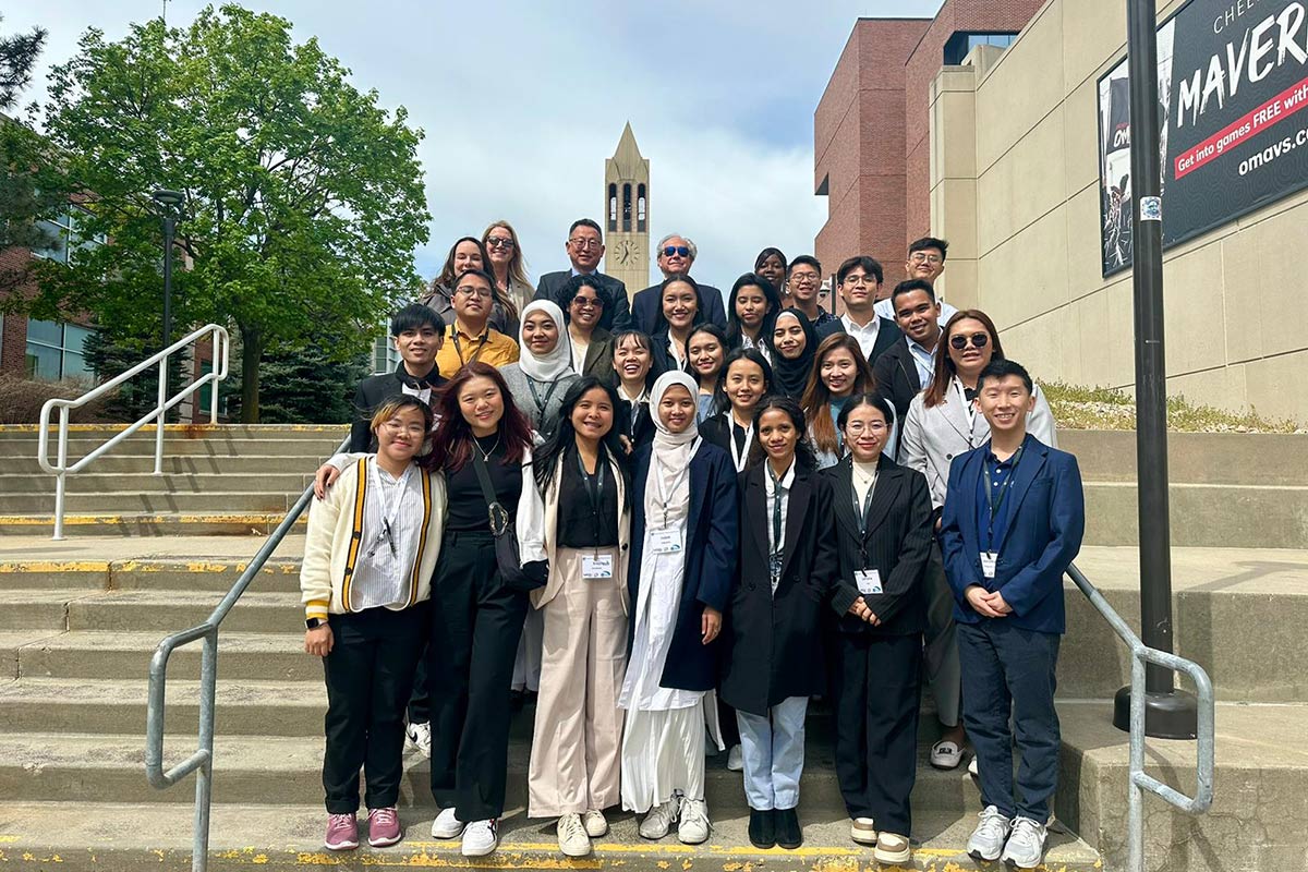 UNO YSEALI Fellows pose for a photo outside of Milo Bail Student Center. 