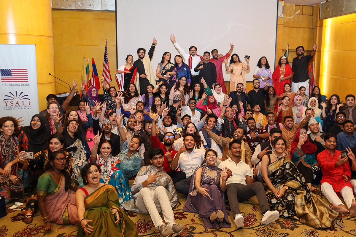 A large group of people pose for a photo.