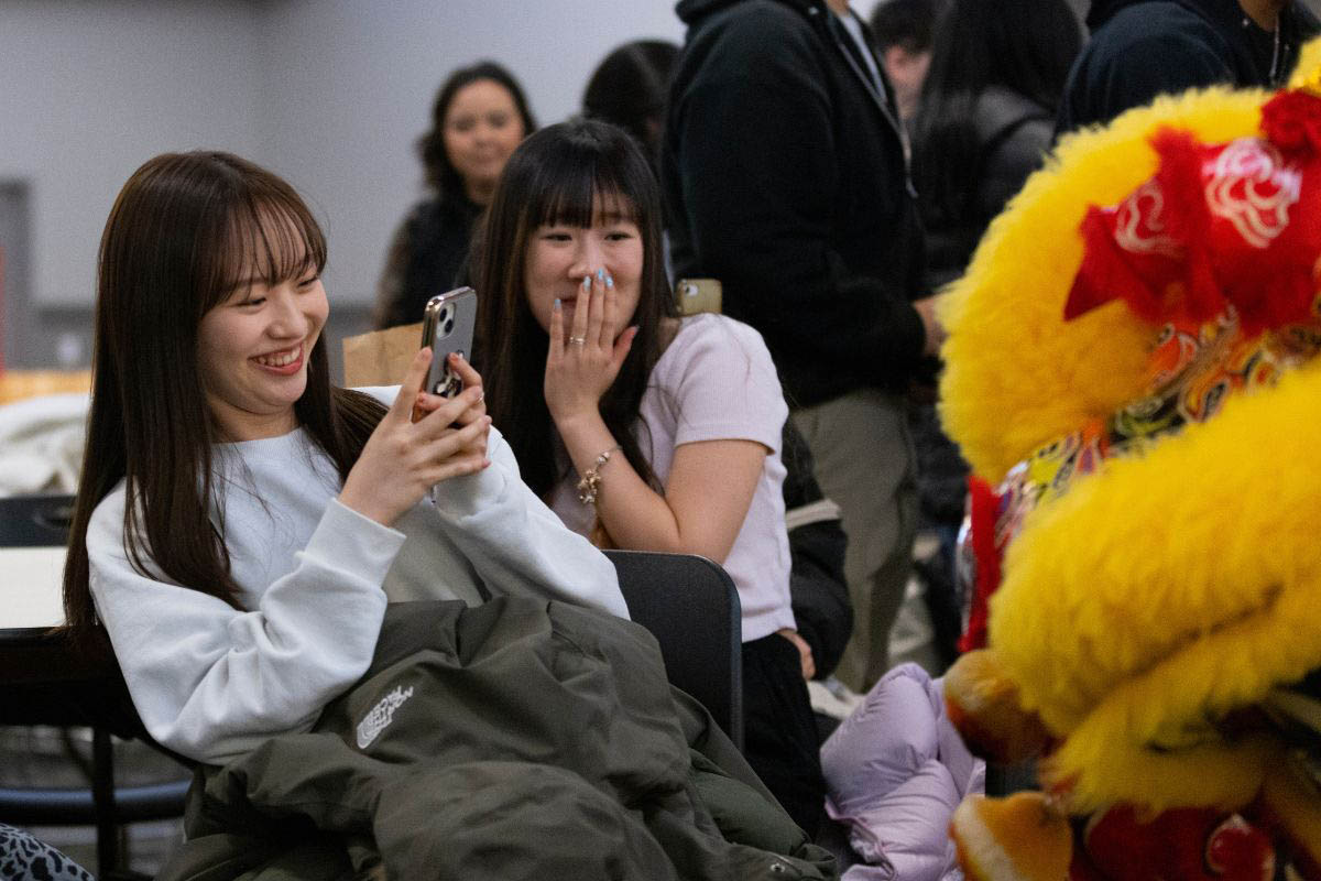 Students attend a Lunar New Year celebration.