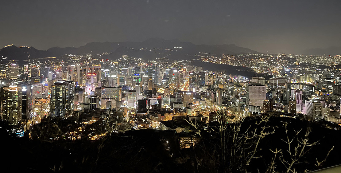 View of a Korean skyline at night, from above