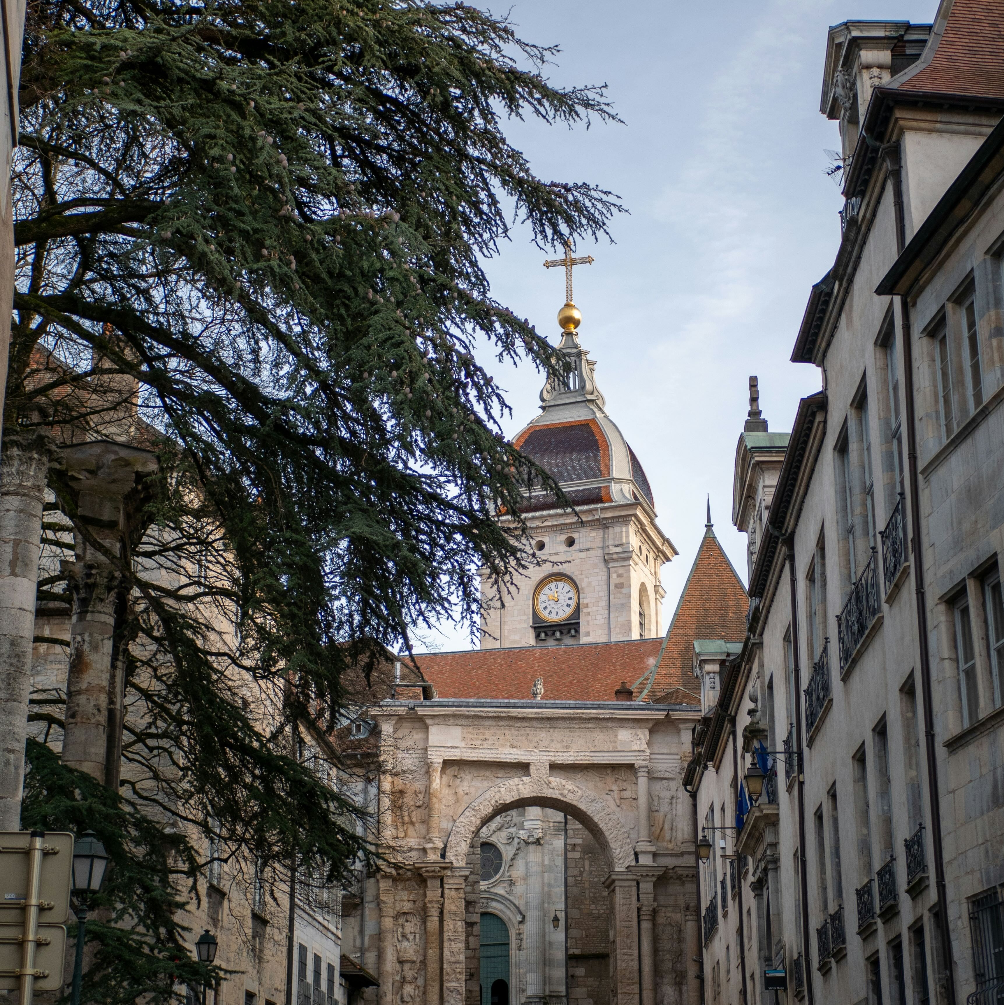 A historic cathedral and arch in Besançon, France