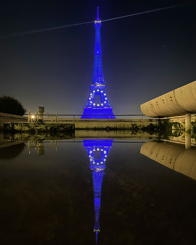 The Eiffel Tower lit up in the colors of the European Union