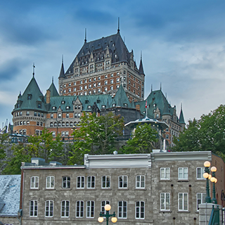 A large brick building in the middle of Quebec City.