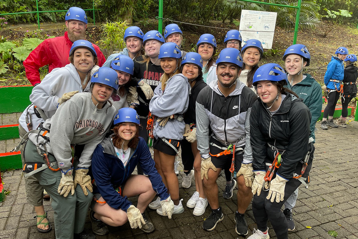 Students wearing helmets prepare for an activity in Costa Rica