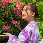 Young woman looking at flowers