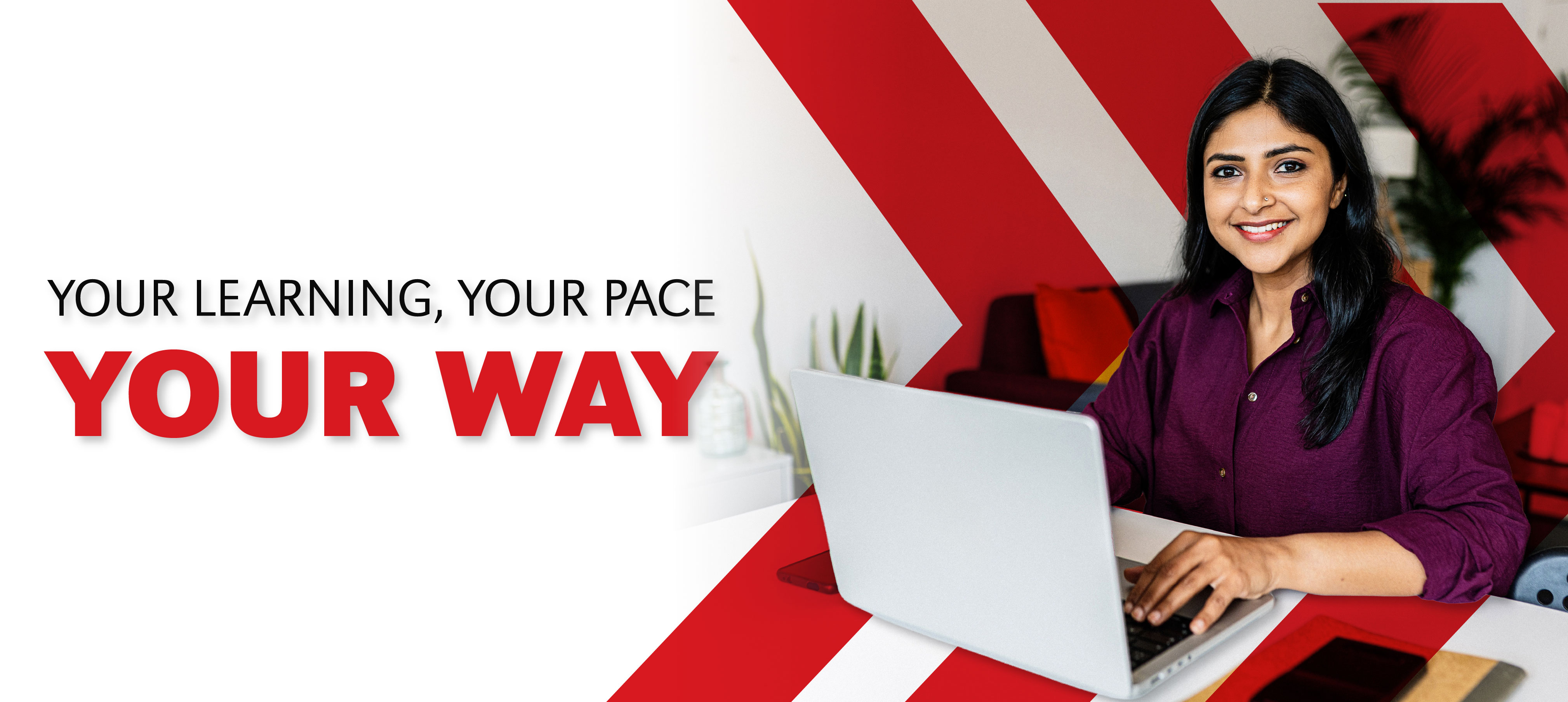 Woman smiling while using a laptop at a desk, with text reading “Your learning, your pace, your way”