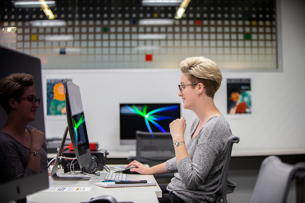 student working at computer station