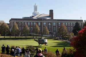 HUEY helicopter landing on UNO campus in front of Arts & Sciences hall
