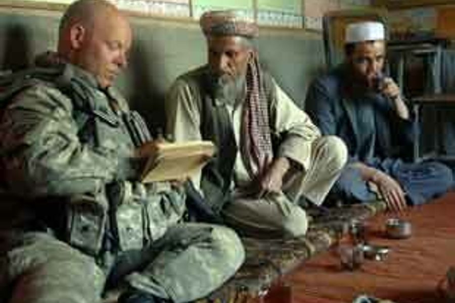 Veteran Robert Holbert working with Afghan teachers.