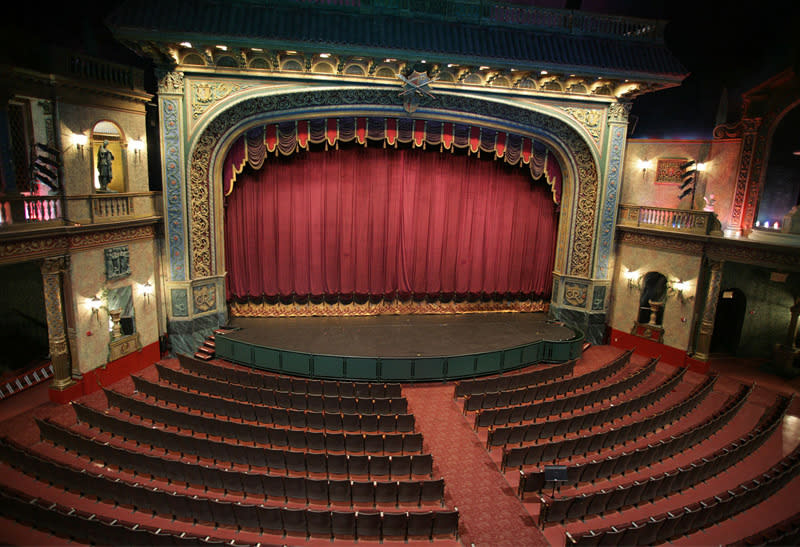 A logo for the Rose Theater