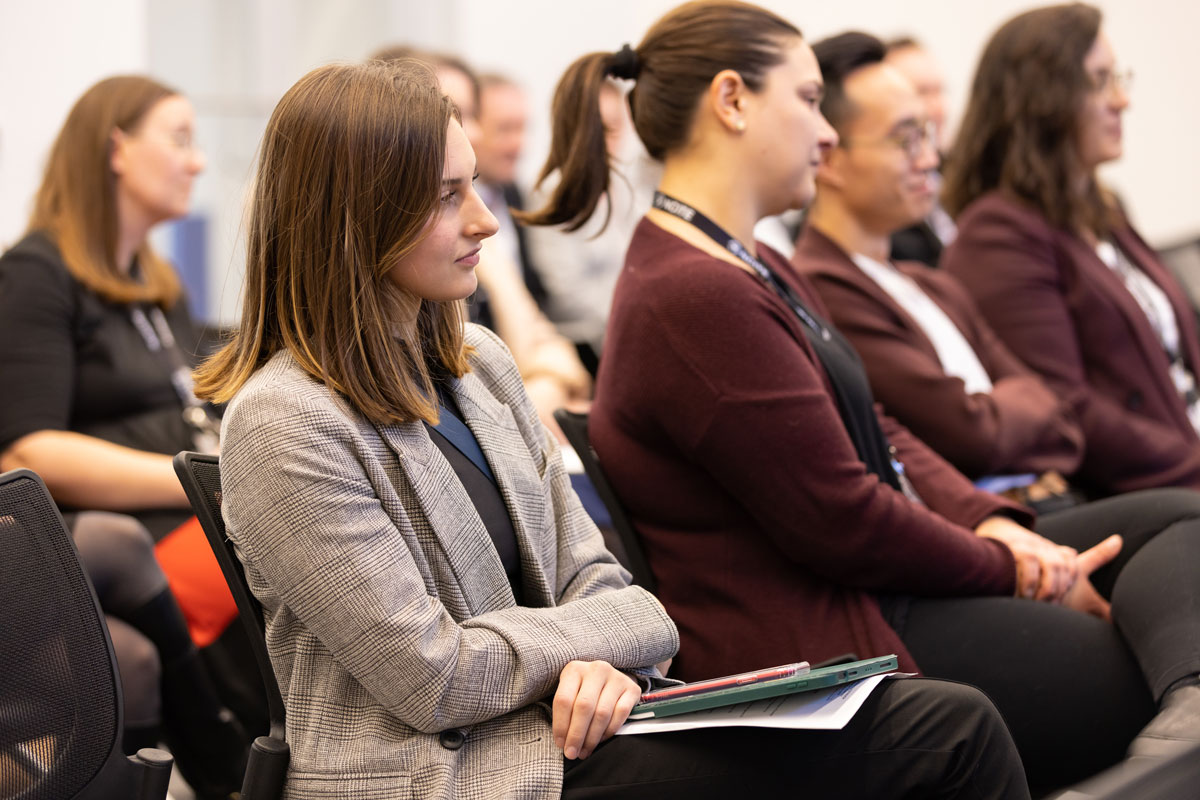 Students in the crowd listen during Dimitri Kusnezov's fireside chat. 