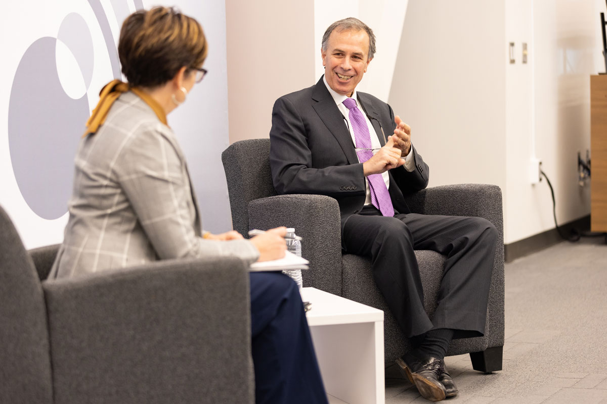 Dimitri Kusnezov sits on stage during his fireside chat with students.