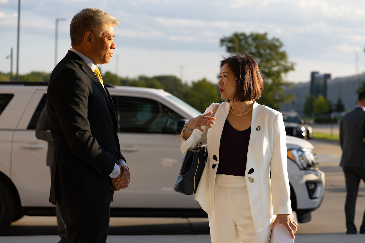 This photo shows DHS Deputy Secretary greeting UNO Chancellor Li outside Mammel Hall in Omaha.