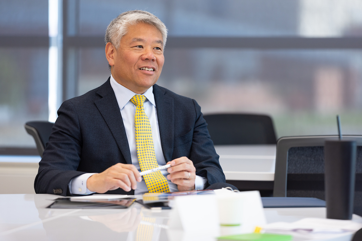 This is a straight forward shot of DHS Deputy Secretary John Tien, who is a middle-aged Asian-American man in a suit and tie.