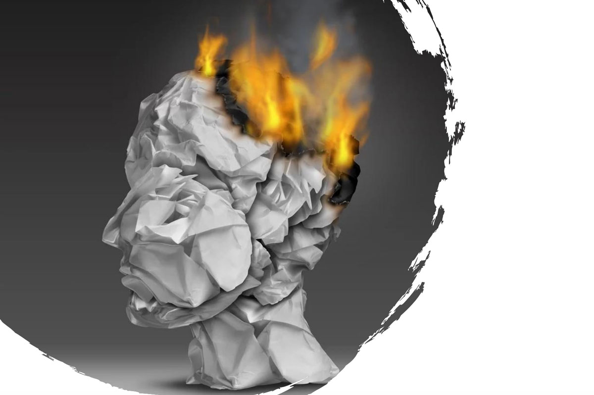 Graphic illustration of a person's head made of paper, and the paper on fire.