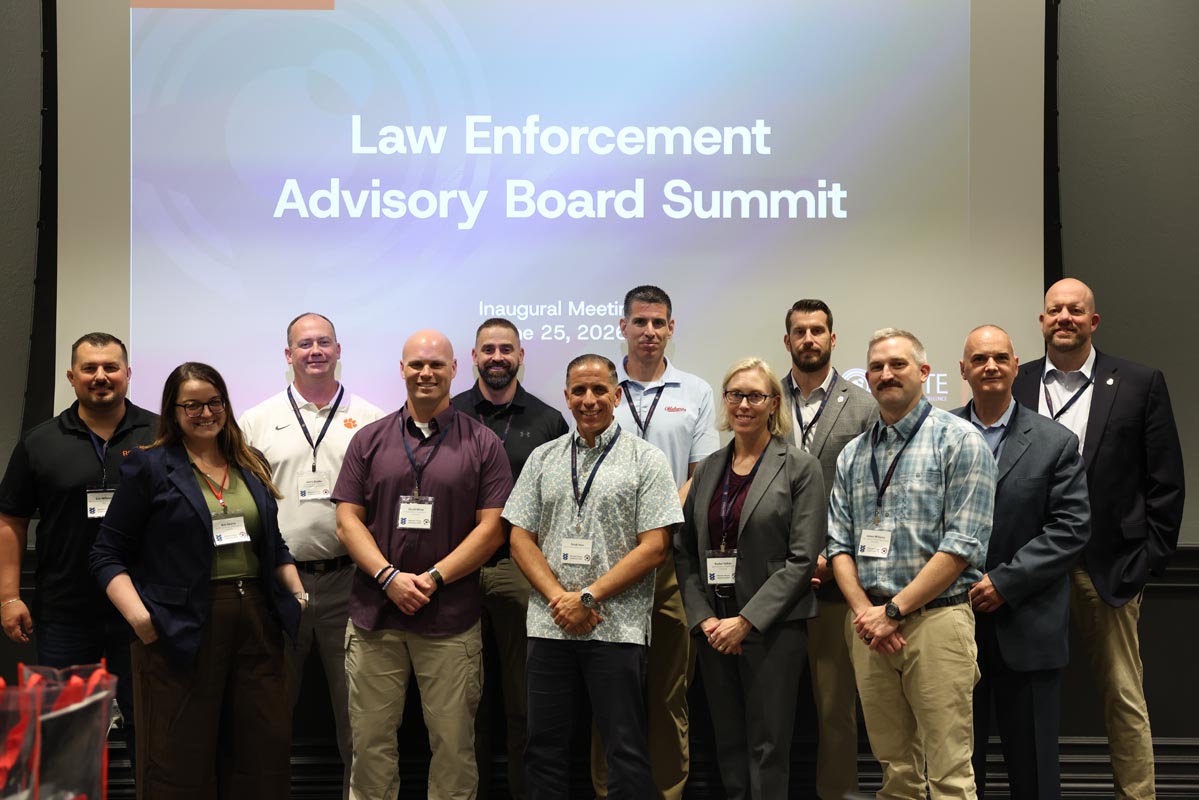 Participants pose for a group photo at the inaugural Law Enforcement Advisory Board Summit.