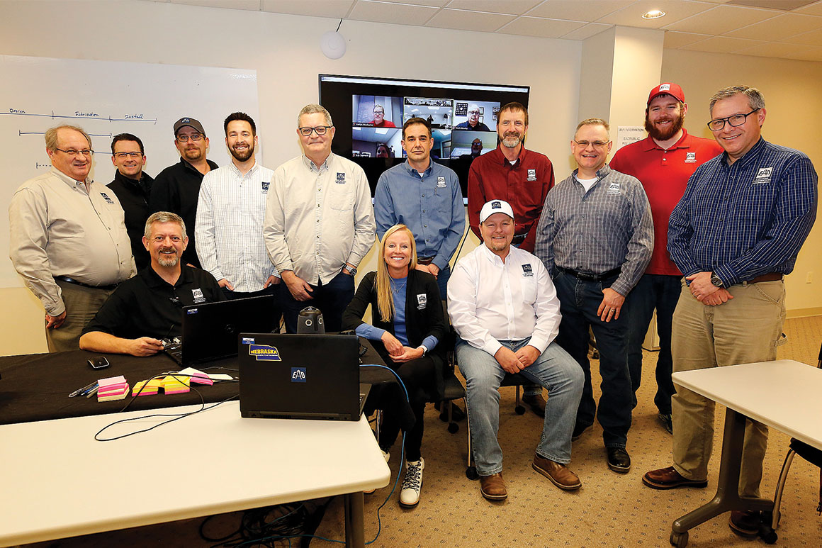 EAD Staff pictured. Seated: Steve Lichter, Debra Lammel and Dean Epperson; standing (l-r): Jonathan Fant, Brian Klausen, Matt Doeden, Dustin Van Cleve, Jim Worden, Adam Melby, Lon Jensen, Ed Gaither, Wyatt Hunter-Johnson and Barry Hale.