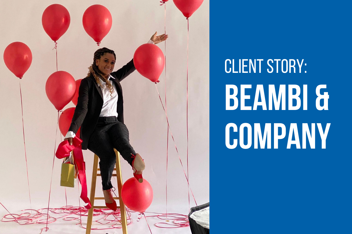 Owner of BeAmbi & Company Rayneesha Yvonne poses with red balloons