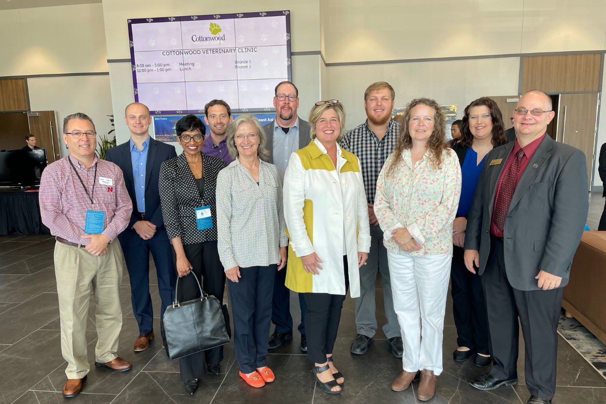 Davis-Magnuson pictured with NBDC colleagues and UNO CBA Dean Michelle Trawick