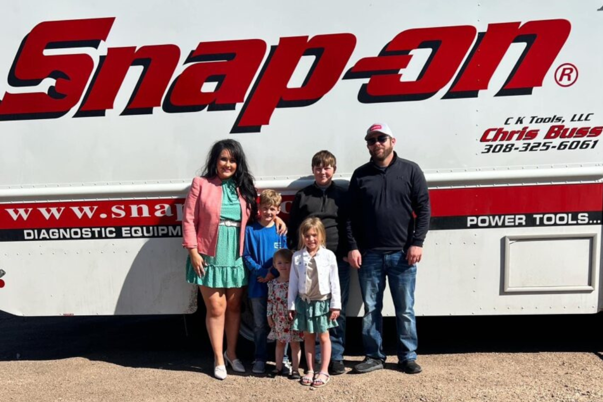 Chris and Karlie Buss of Cozad with their four children.