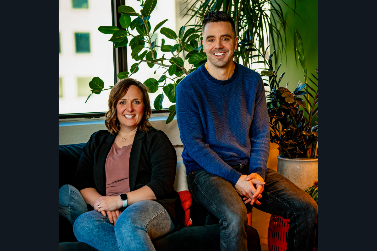 Co-founders Dr. Breanna Hetland and Greg Nelson smile at the camera