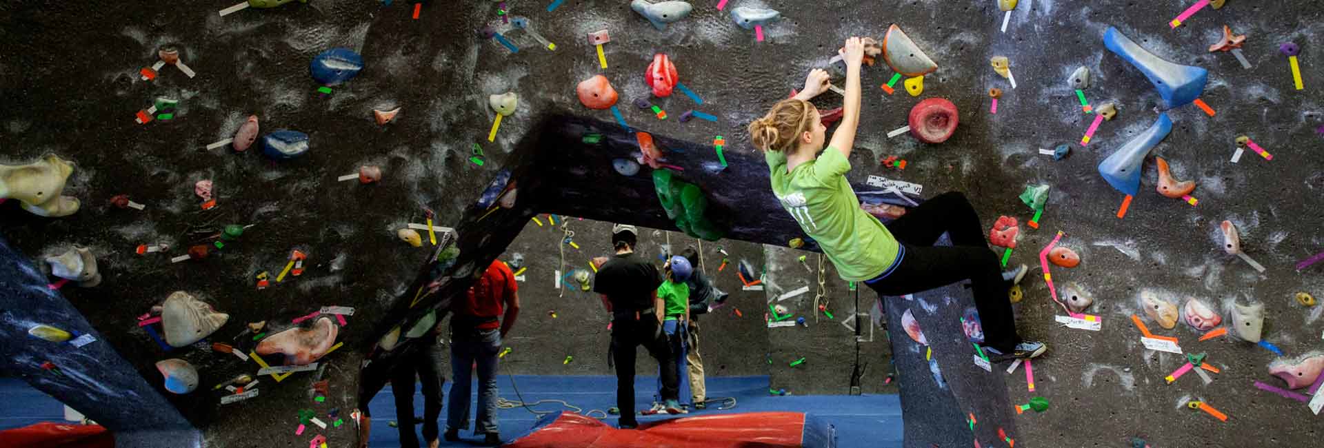 A student at the UNO Climbing Wall