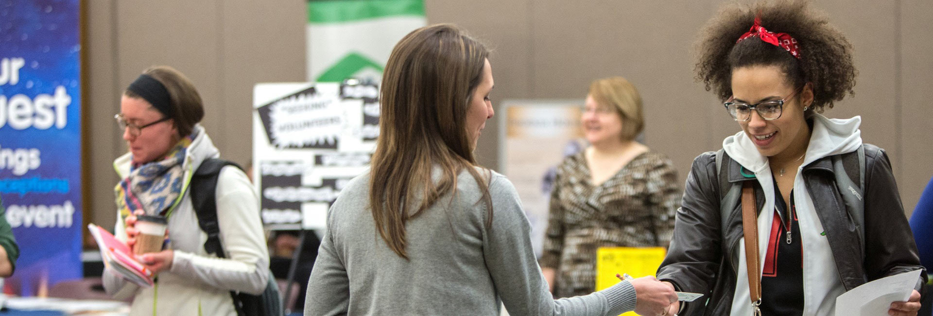 A student attends the volunteer fair