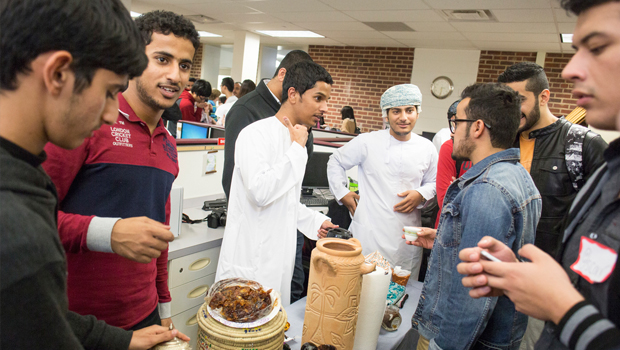 Students explore and demonstrate cultural customs during Café Internationale, a part of International Studies & Program's International Education Week.
