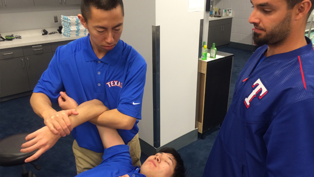 Yamato Nonaka practices a stretching technique