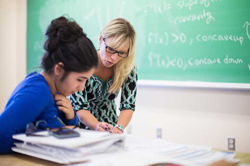 Professor and student in class