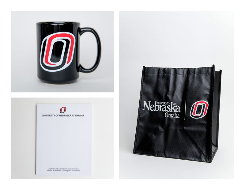 black bag, coffee mug, note pad