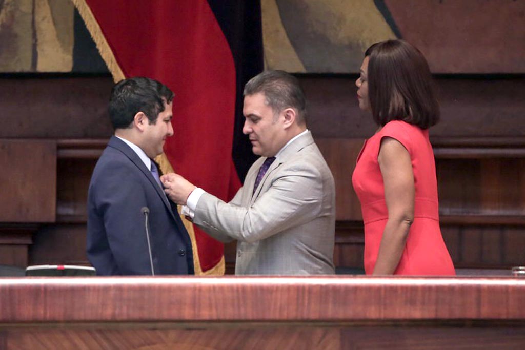 UNO's Washington Garcia is presented with Ecuador's highest civilian honor