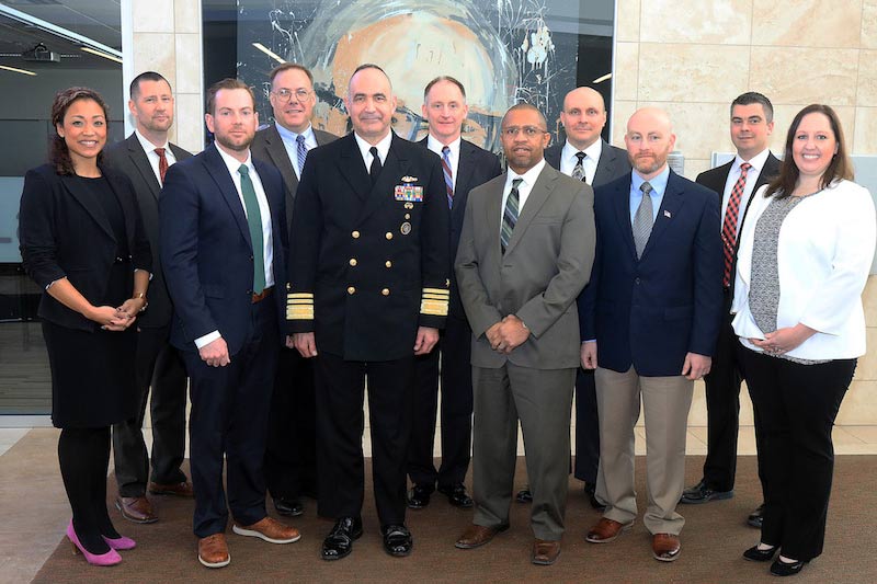 Faculty and USSTRATCOM Strategic Leadership Fellows Program participants pose for a photo 