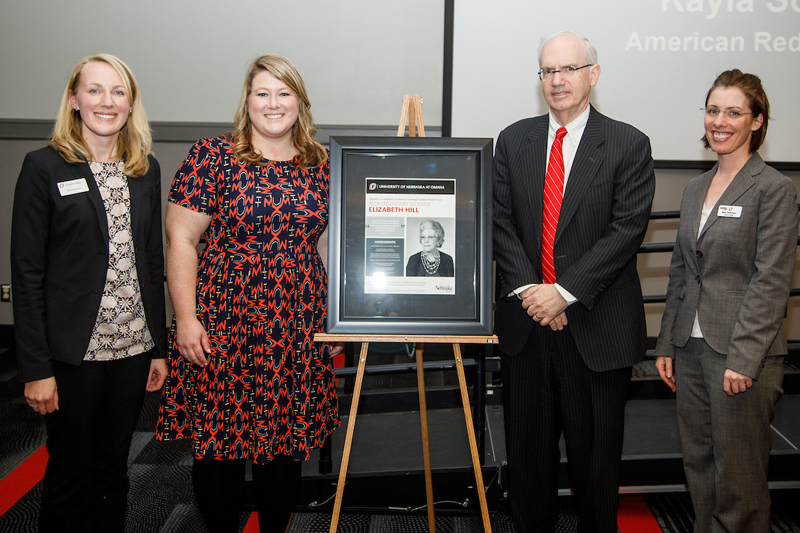 From left: CCSW Co-chair Sammi Kaiser, alumna Kayla Scott, Chancellor Jeffrey P. Gold, M.D., and CCSW Co-chair Dr. Mary Perkinson.