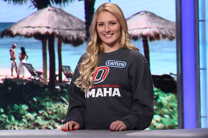 UNO student Caitlyn Marco poses on the set of "Wheel of Fortune." Image courtesy Carol Kaelson.