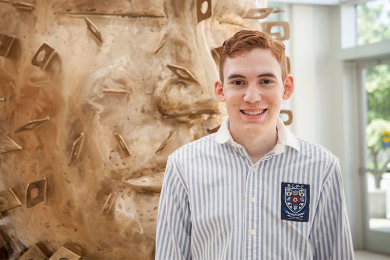 Brian Lacy stands inside Mammel Hall