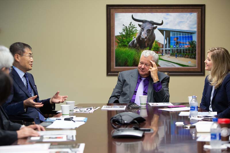 Delegates from Shizuoka University visit with UNO leaders