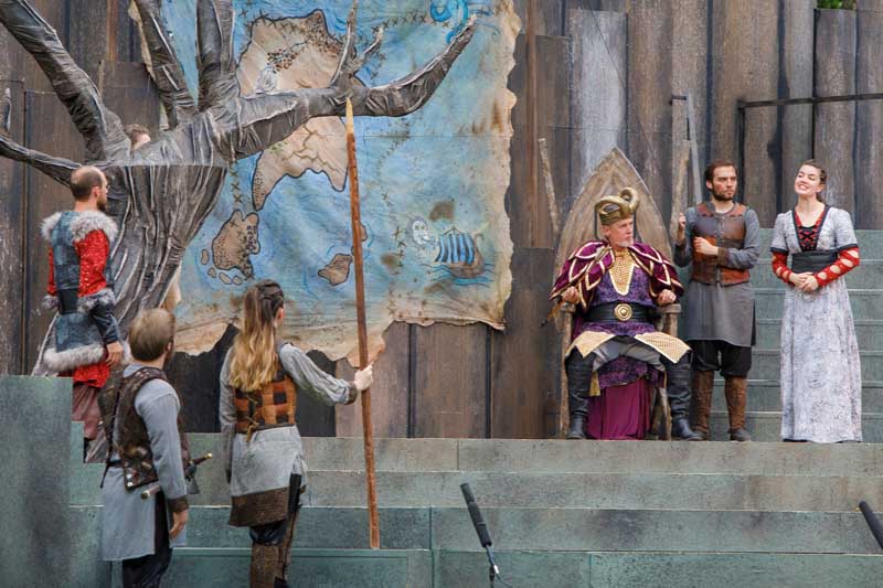 A scene from Shakespeare's 'King Lear' is depicted at 2017's Shakespeare on the Green event.