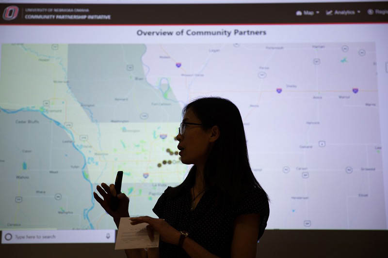 MIS student Lingli Gan presents a progress report on a Community Engagement tool being developed as part of an IS&T capstone course